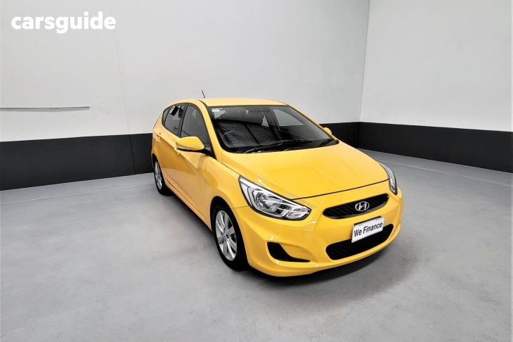 Yellow 2018 Hyundai Accent Hatchback Sport
