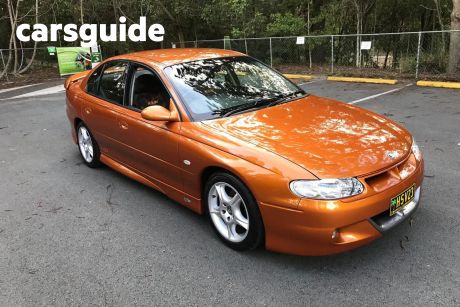 Orange 1999 HSV XU6 Sedan