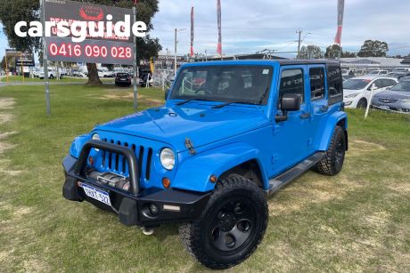 Blue 2011 Jeep Wrangler Softtop Unlimited Sport (4X4)