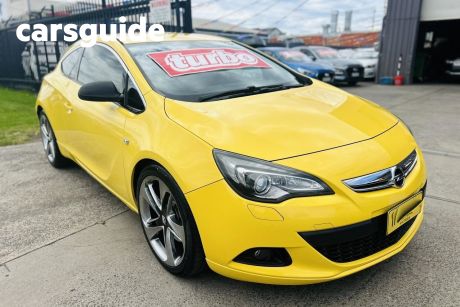 Yellow 2012 Opel Astra Coupe GTC 1.6 Sport