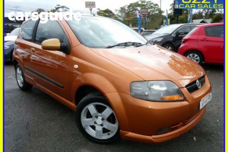 Orange 2006 Holden Barina Hatchback