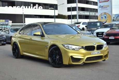 Yellow 2015 BMW M3 Sedan