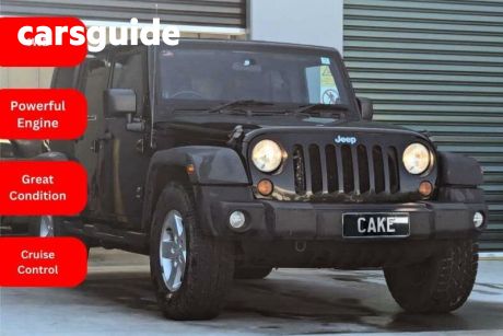 Black 2009 Jeep Wrangler Softtop Unlimited Sport (4X4)