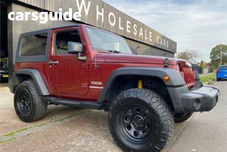 Red 2009 Jeep Wrangler Softtop Sport (4X4)