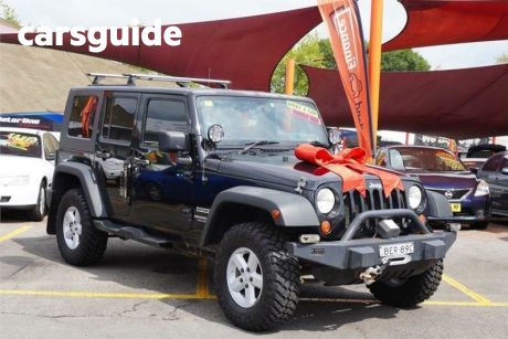 Black 2007 Jeep Wrangler Softtop Unlimited Sport (4X4)