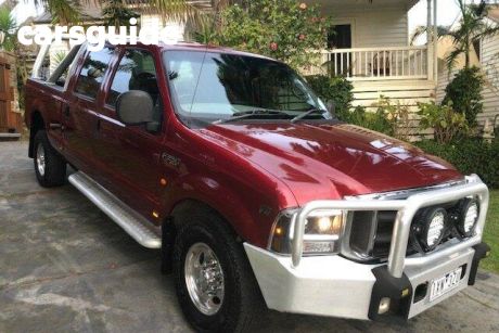 Red 2004 Ford F250 Crew Cab Pickup XLT