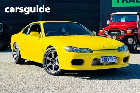 Yellow 2002 Nissan 200SX Coupe Spec S