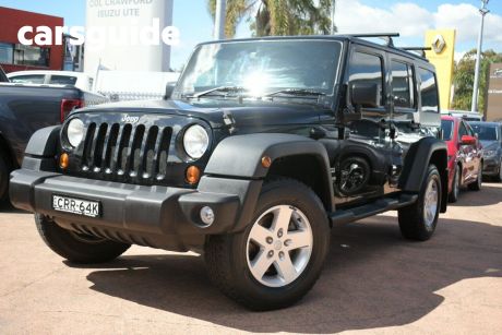 Black 2013 Jeep Wrangler Softtop Unlimited Sport (4X4)