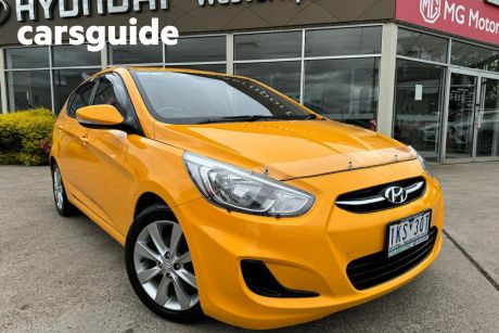 Yellow 2017 Hyundai Accent Hatchback Sport