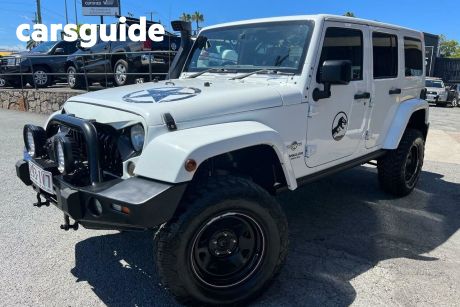 White 2014 Jeep Wrangler Unlimited Softtop Freedom (4X4)