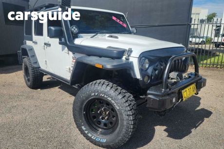 White 2014 Jeep Wrangler Softtop Unlimited Sport (4X4)
