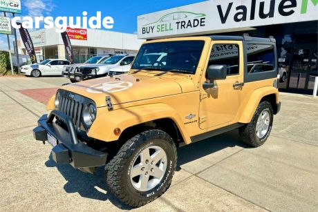 Brown 2014 Jeep Wrangler Softtop Freedom (4X4)