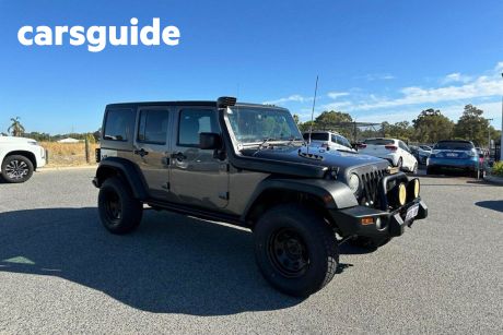 Black 2017 Jeep Wrangler Unlimited Softtop Sport (4X4)