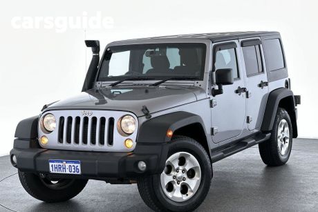 Silver 2014 Jeep Wrangler Softtop Unlimited Sport (4X4)