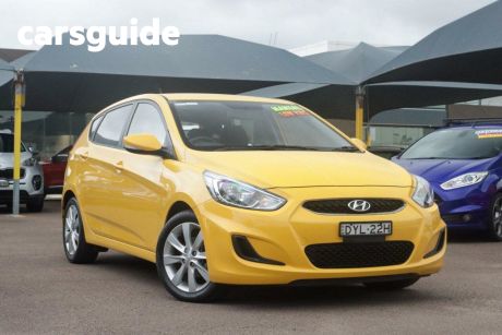 Yellow 2018 Hyundai Accent Hatchback Sport