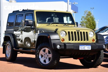 Green 2013 Jeep Wrangler Convertible Unlimited Sport