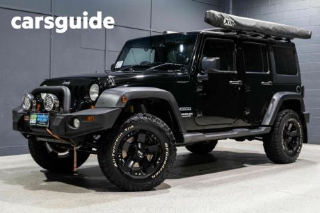 Black 2013 Jeep Wrangler Softtop Unlimited Sport (4X4)