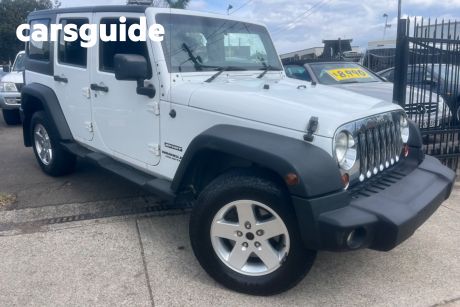 White 2011 Jeep Wrangler Softtop Unlimited Sport (4X4)