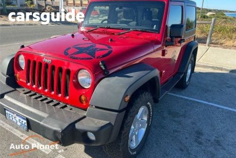Red 2010 Jeep Wrangler Softtop Sport (4X4)