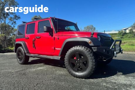 Red 2008 Jeep Wrangler Softtop Unlimited Sport (4X4)