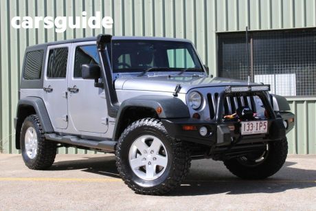 Silver 2012 Jeep Wrangler Softtop Unlimited Sport (4X4)