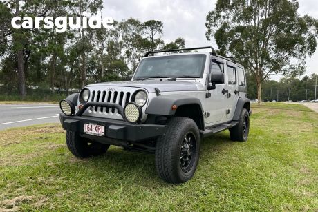 Silver 2010 Jeep Wrangler Softtop Unlimited Sport (4X4)