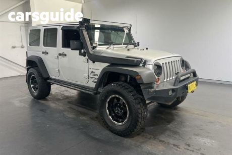 Silver 2009 Jeep Wrangler Softtop Unlimited Sport (4X4)