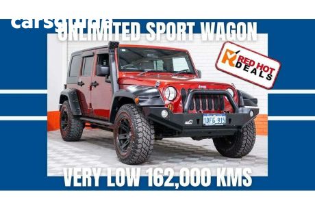 Red 2007 Jeep Wrangler Softtop Unlimited Sport (4X4)