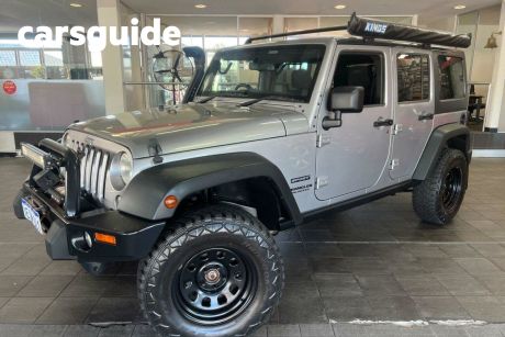 Silver 2014 Jeep Wrangler Softtop Unlimited Sport (4X4)
