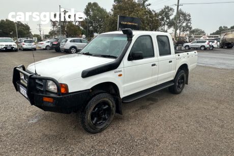 White 2000 Ford Courier Crew Cab Pickup GL (4X4)