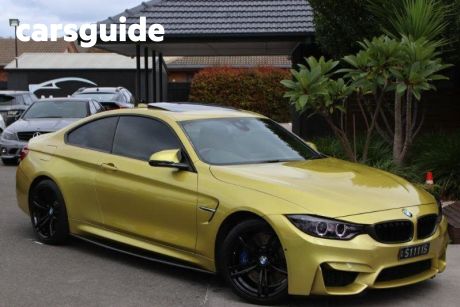 Yellow 2014 BMW M4 Coupe