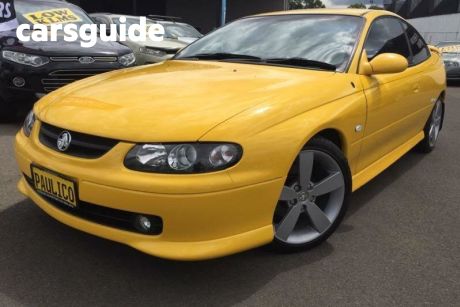 Yellow 2003 Holden Monaro Coupe CV8