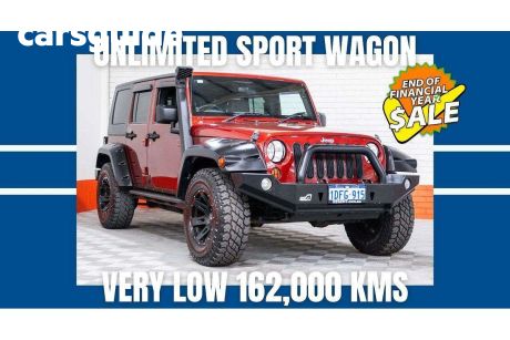 Red 2007 Jeep Wrangler Softtop Unlimited Sport (4X4)