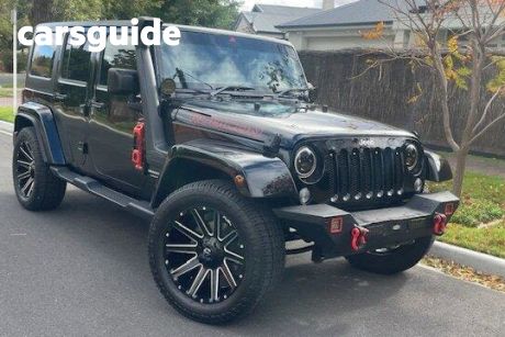 Black 2018 Jeep Wrangler Unlimited Softtop Sport (4X4)