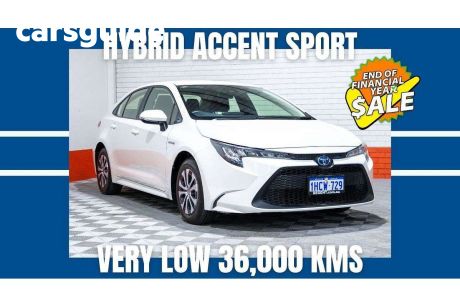 White 2020 Toyota Corolla Sedan Ascent Sport (hybrid)
