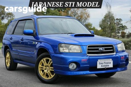 Blue 2004 Subaru Forester Wagon STi