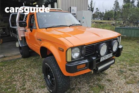 Red 1981 Toyota Hilux Ute Tray