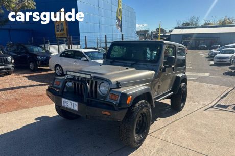 Gold 2006 Jeep Wrangler Softtop Sport (4X4)