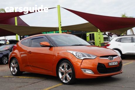 Orange 2012 Hyundai Veloster Coupe +