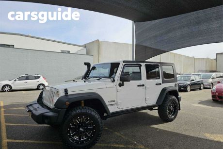 White 2009 Jeep Wrangler Softtop Unlimited Sport (4X4)