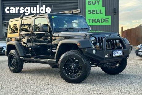 Black 2015 Jeep Wrangler Unlimited Softtop Sport (4X4)