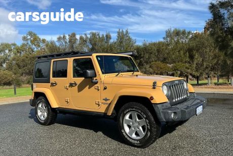 Brown 2014 Jeep Wrangler Unlimited Softtop Freedom (4X4)