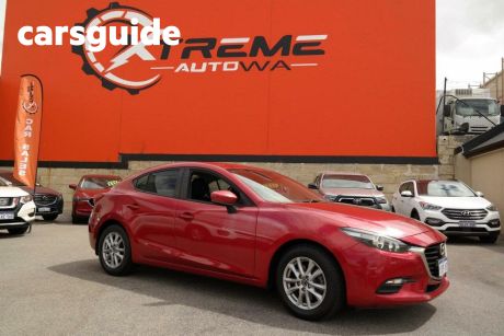 Red 2017 Mazda Mazda3 OtherCar