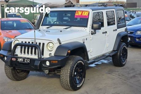 White 2016 Jeep Wrangler Unlimited Softtop Sport (4X4)