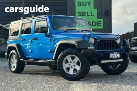 Blue 2014 Jeep Wrangler Softtop Unlimited Sport (4X4)