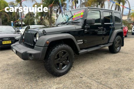 Black 2009 Jeep Wrangler Softtop Unlimited Sport (4X4)