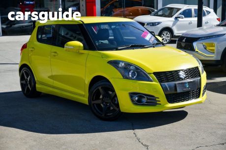 Yellow 2016 Suzuki Swift Hatchback Sport Navigator
