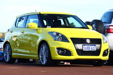 Yellow 2016 Suzuki Swift Hatchback Sport Navigator