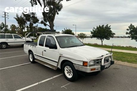 White 2001 Ford Courier Crew Cab Pickup XL
