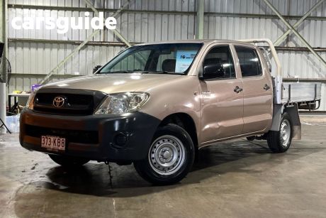 Brown 2009 Toyota Hilux Dual Cab Pick-up Workmate